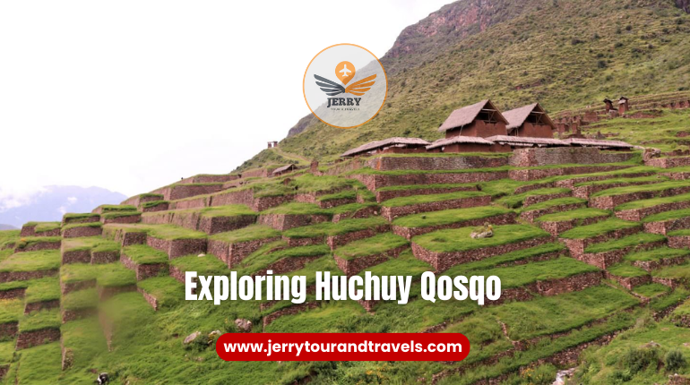 A scenic trail leading to the ancient ruins of Huchuy Qosqo, surrounded by the majestic Andes Mountains, showcasing the allure of hiking in Peru.