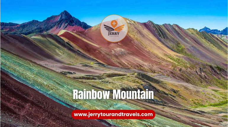 The vibrant, multicolored slopes of Rainbow Mountain, a spectacular destination for hiking in Peru.