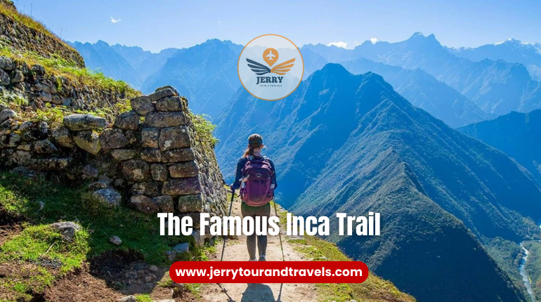 A breathtaking view of the ancient Inca Trail winding through lush greenery and rugged mountains, a premier destination for hiking in Peru.